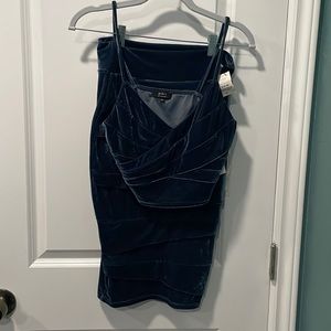 Navy blue swade skirt with  crop top. Never worn. Skirt $15, top$10.